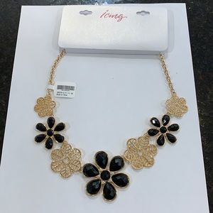 New with tags gold and black statement necklace.